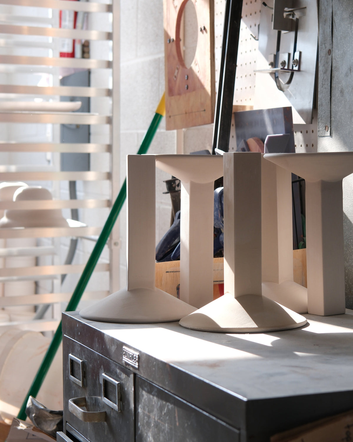 Arthur Pendant shades on a workbench