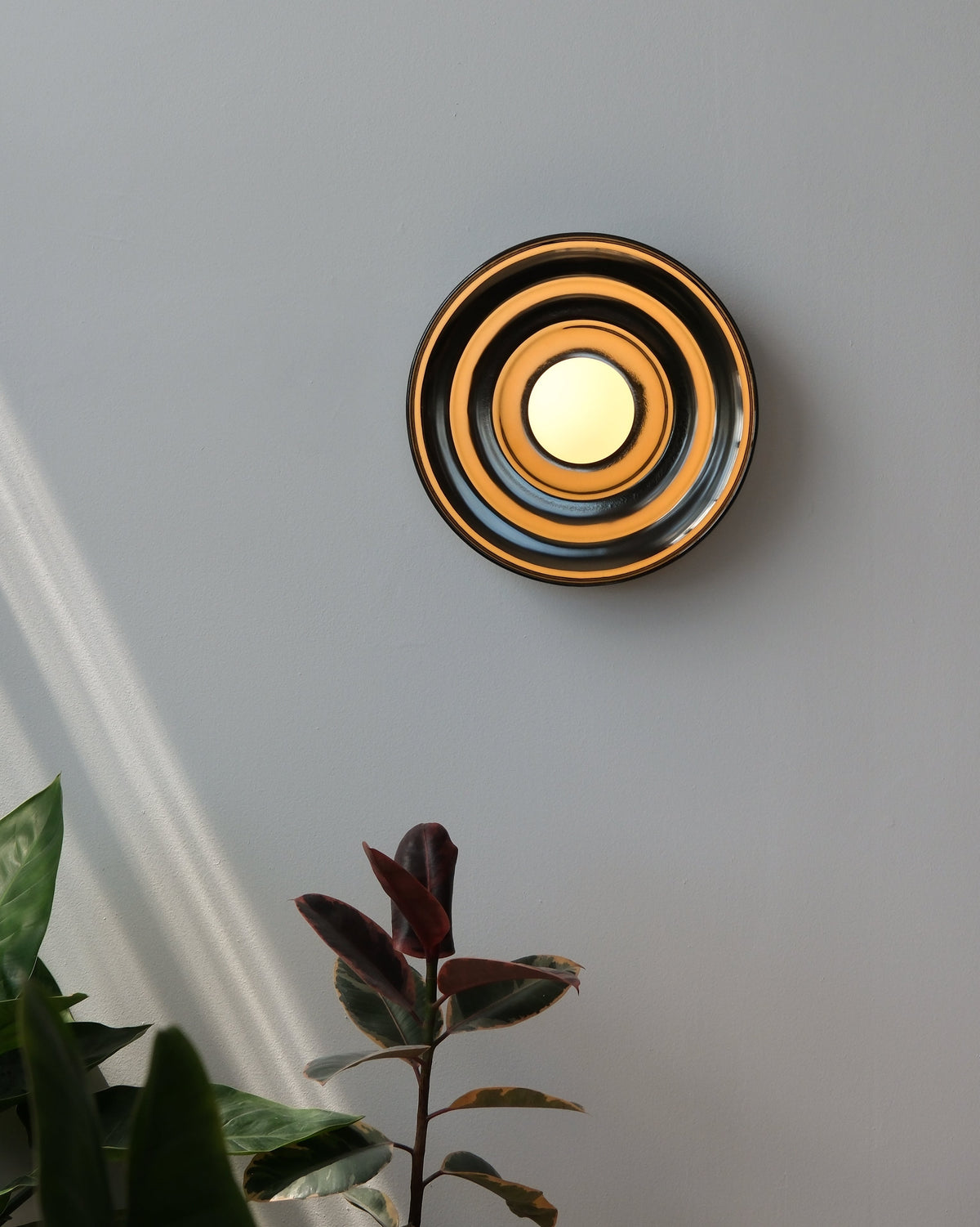 Ripple Bowl Sconce in Chrome, lit, front view