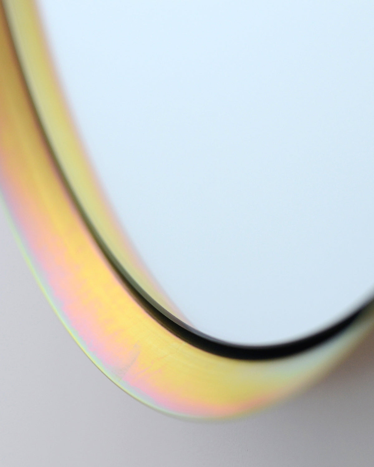 Kendrick Round Mirror in Iridescent, close up of the frame
