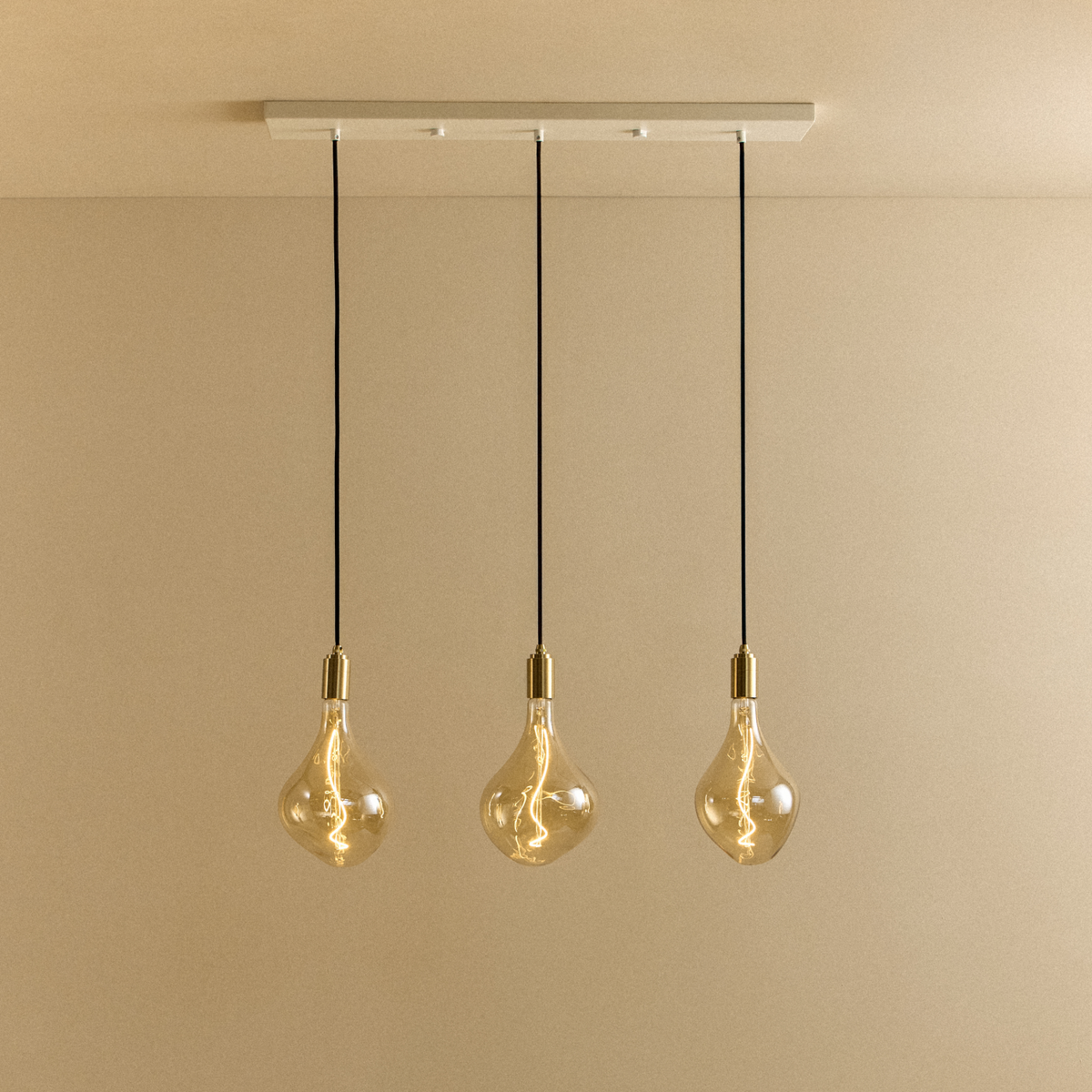 Voronoi II Linear Triple Pendant in Brass by Tala, switched on