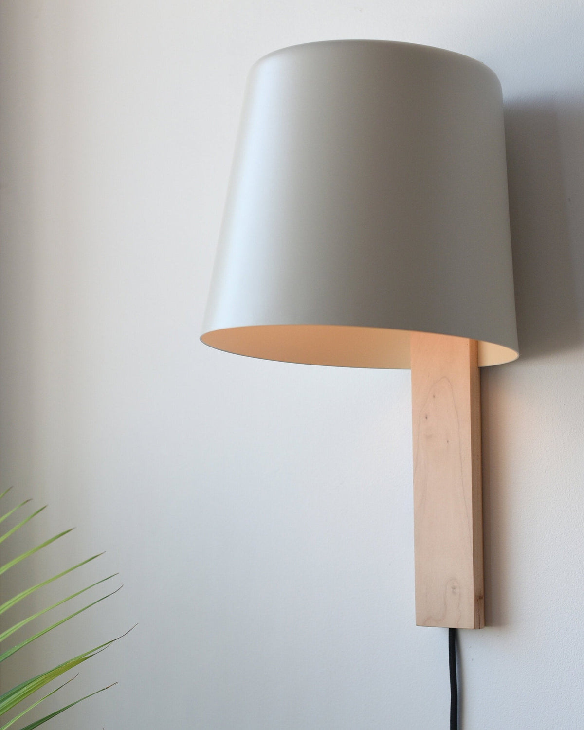 Pilot Sconce, lit, room setting
