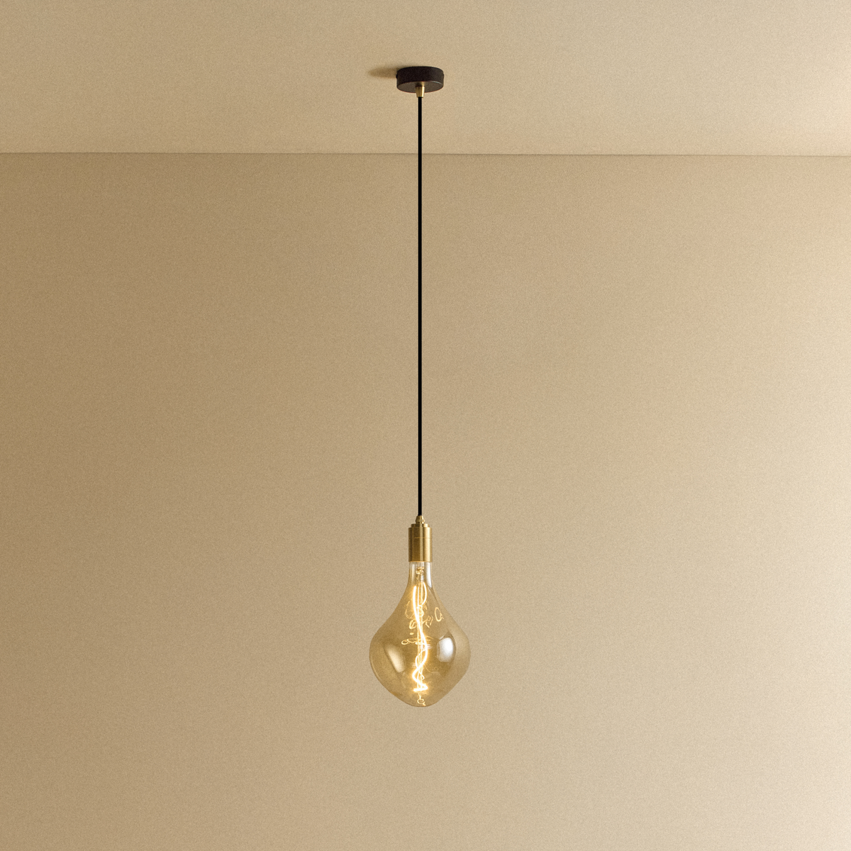 Voronoi II Pendant Light in Brass by Tala, switched on, hanging from a ceiling canopy