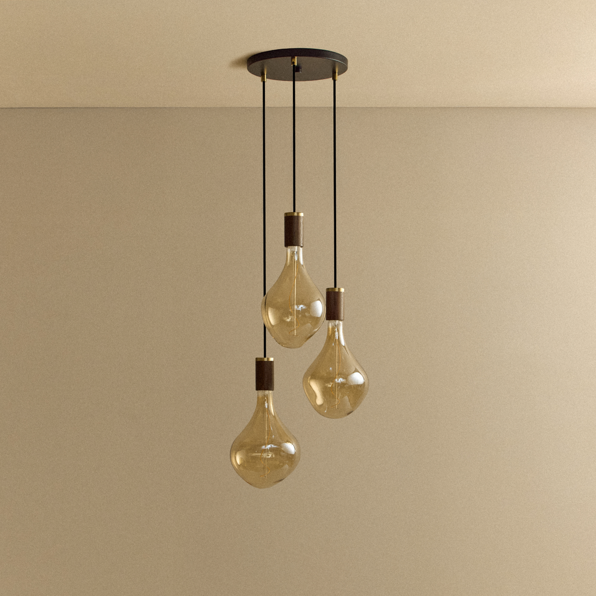 Voronoi II Triple Pendant in Walnut with a black canopy, switched off