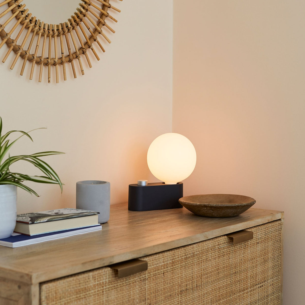 Alumina Lamp in Charcoal in a hallway