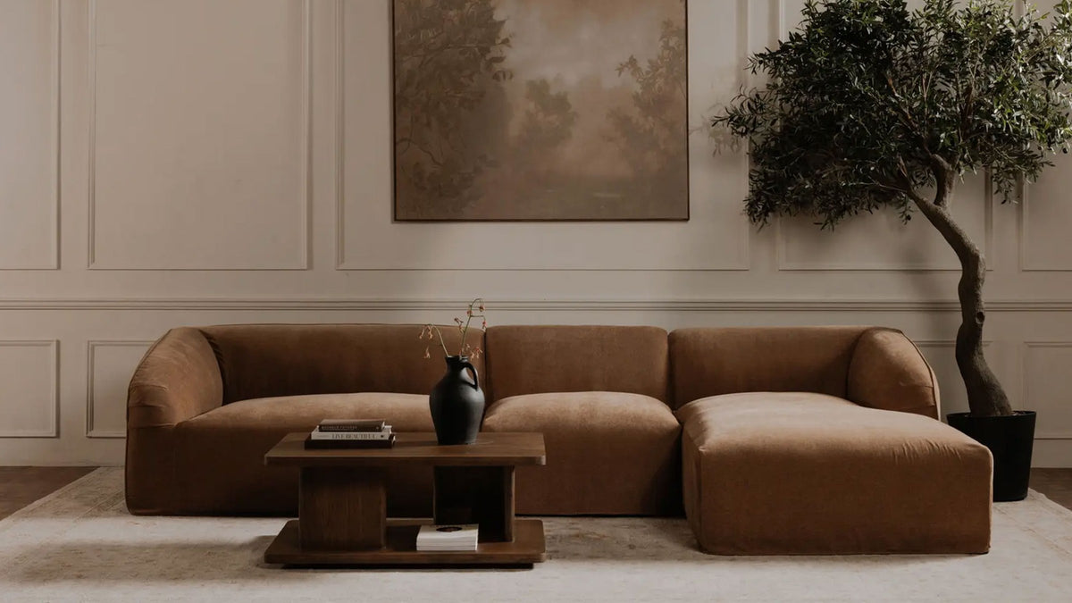 Moe's Home Collection Casey coffee table in the Small size, the same dark brown oak and open base shown against the same caramel sectional so the two footprints can be compared
