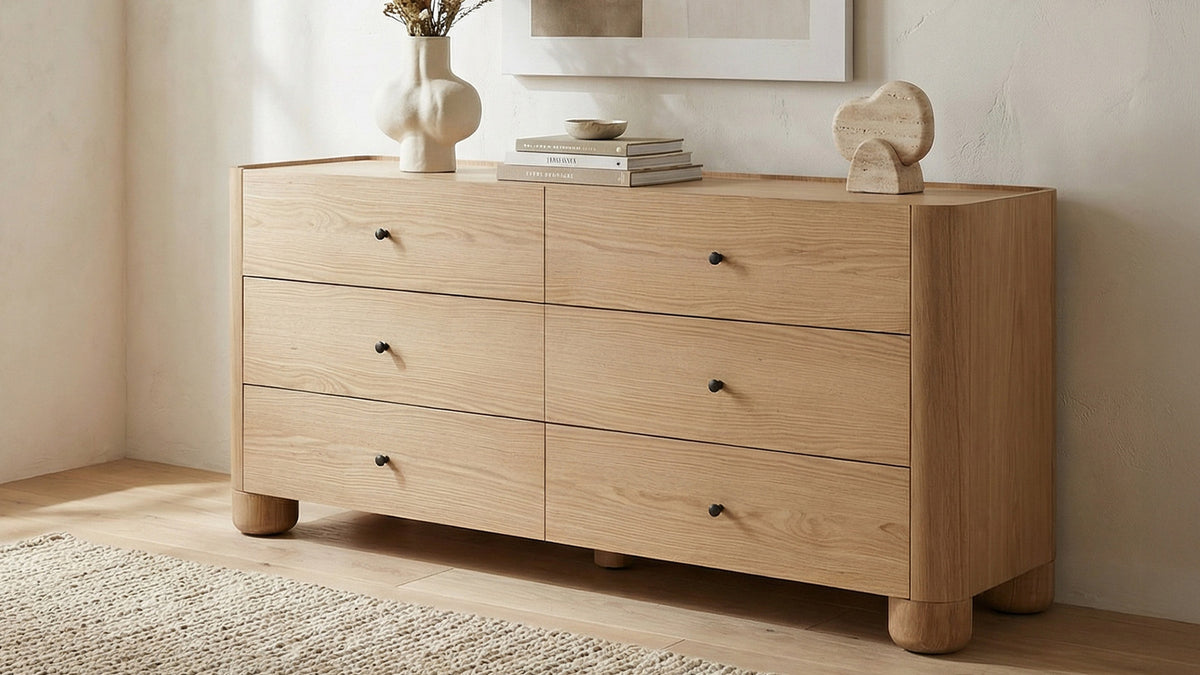 Moe's Home Collection Gibson natural oak dresser styled against a bedroom wall with a lamp and objects on its top