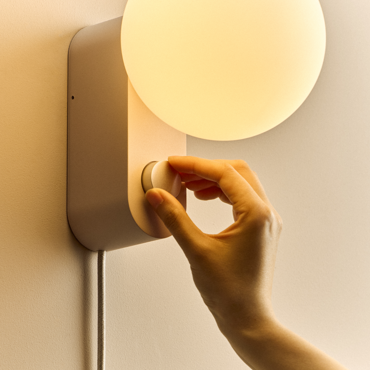 Alumina Lamp in Blossom mounted on a wall, close-up