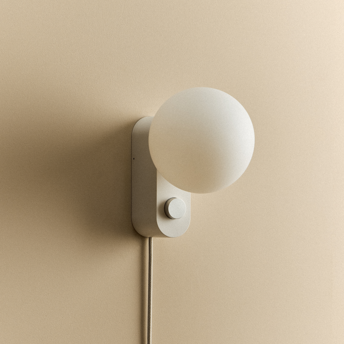 Alumina Lamp in Chalk mounted on a wall, unlit