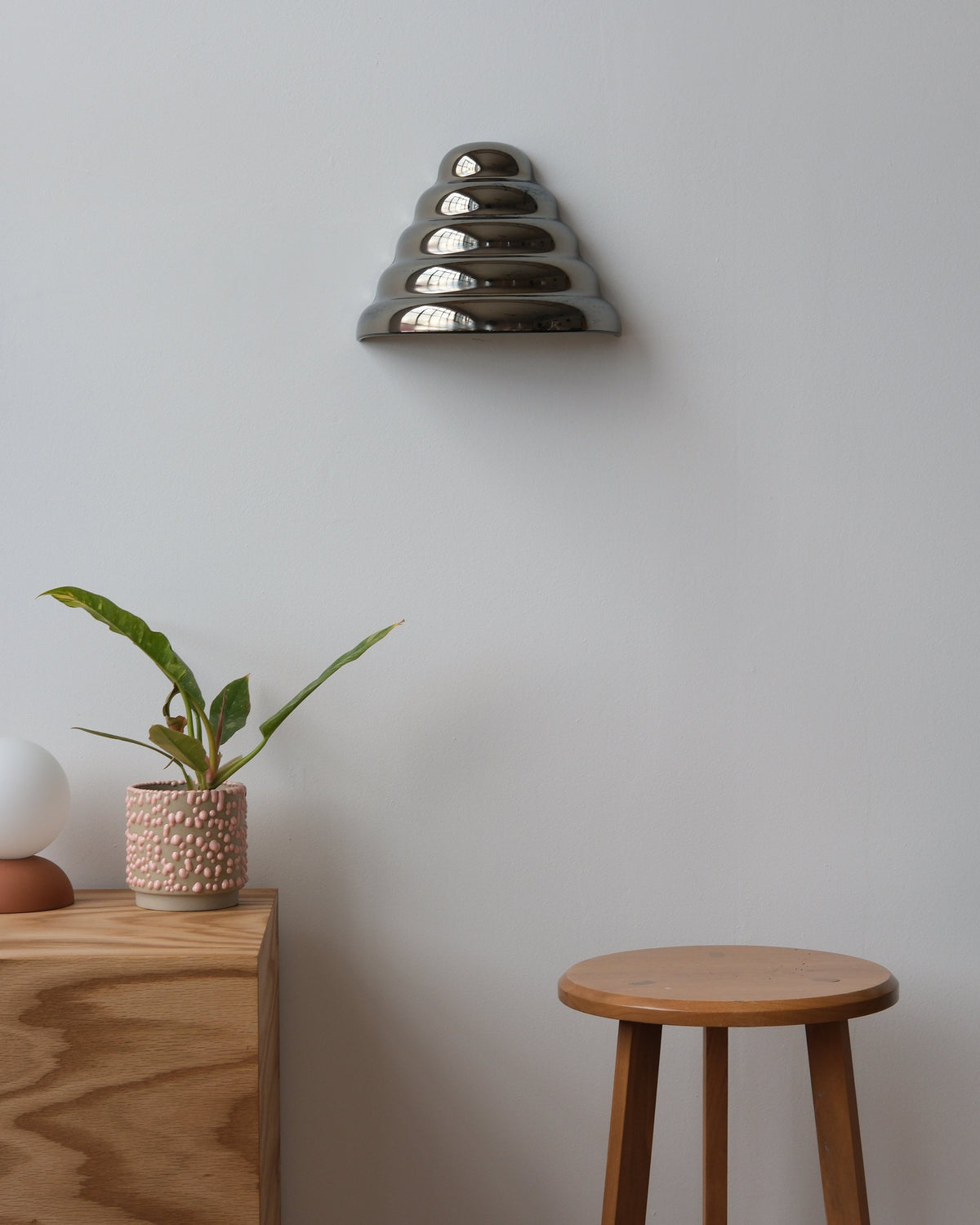 Ripple Conical Sconce in Chrome, room setting