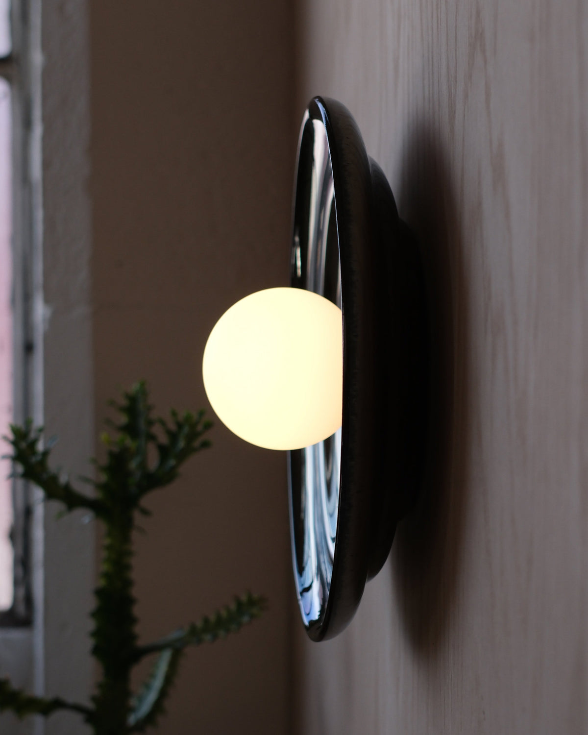 Ripple Bowl Sconce in Chrome, side view