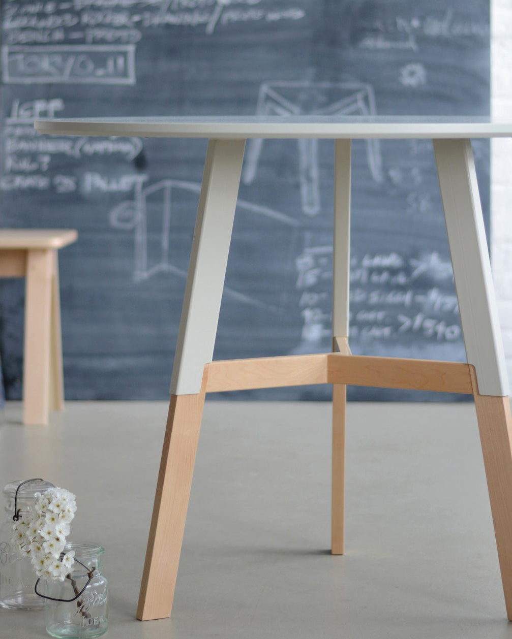 Half Nelson Café Table in Maple, room setting