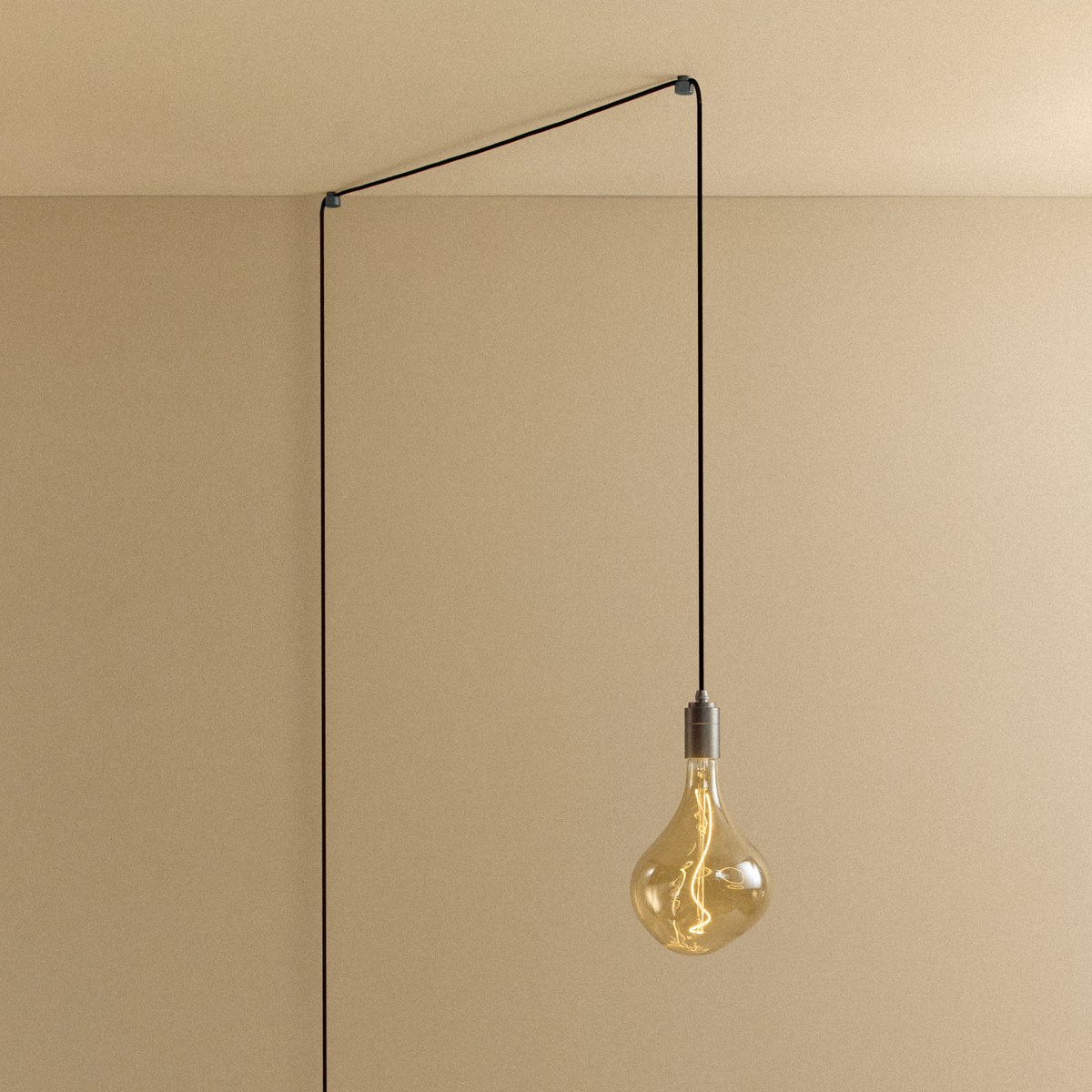 Voronoi II Plug-In Pendant in Graphite by Tala, switched on, with its cable running across the ceiling
