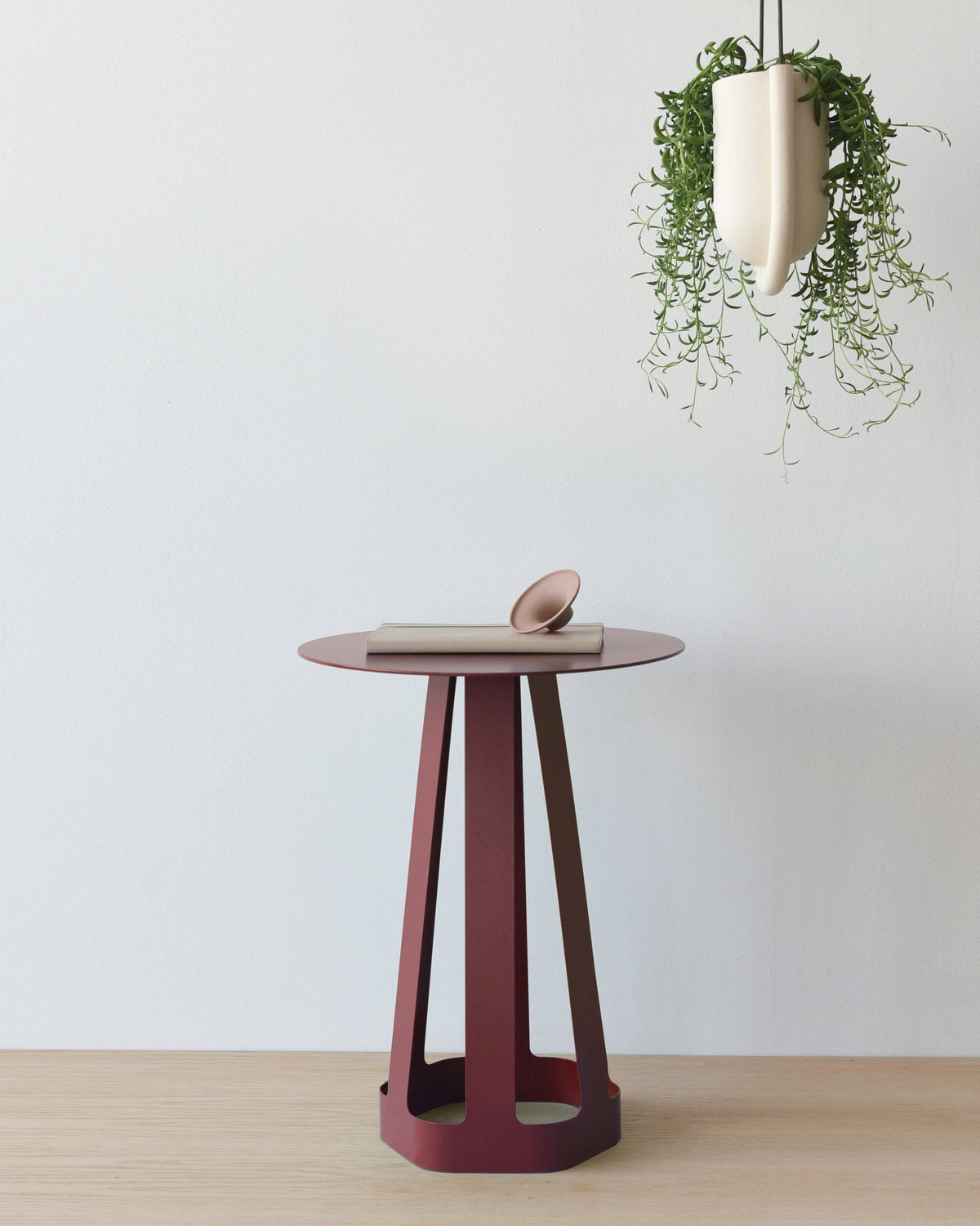 Sixagon Side Table in Ox Blood, room setting