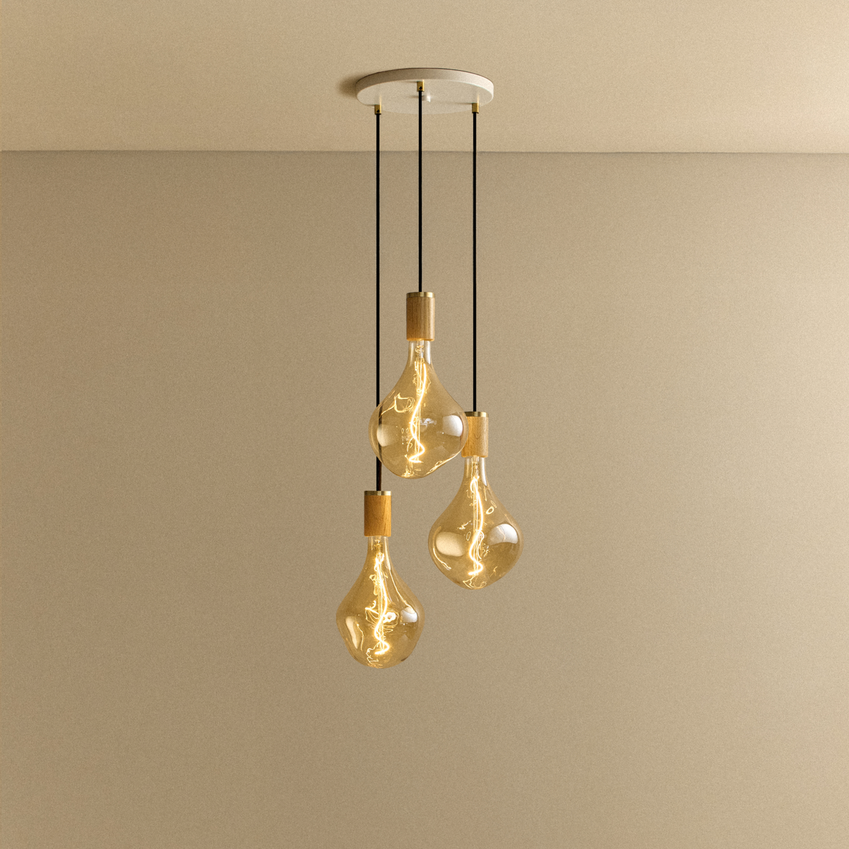 Voronoi II Triple Pendant in Oak by Tala with a white canopy, switched on