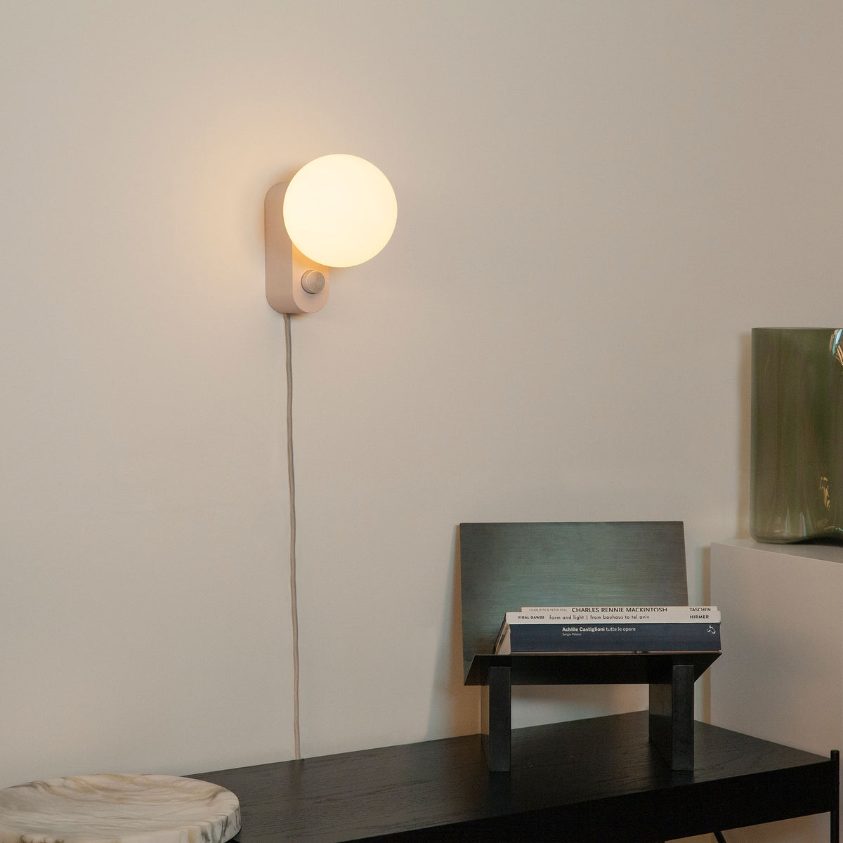 Alumina Lamp in Blossom mounted on a hallway wall