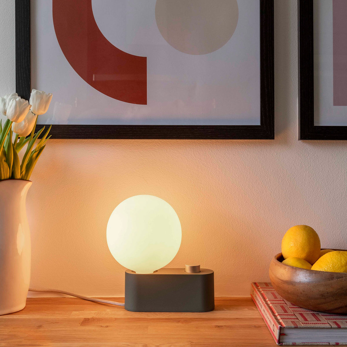 Alumina Lamp in Sage in a hallway