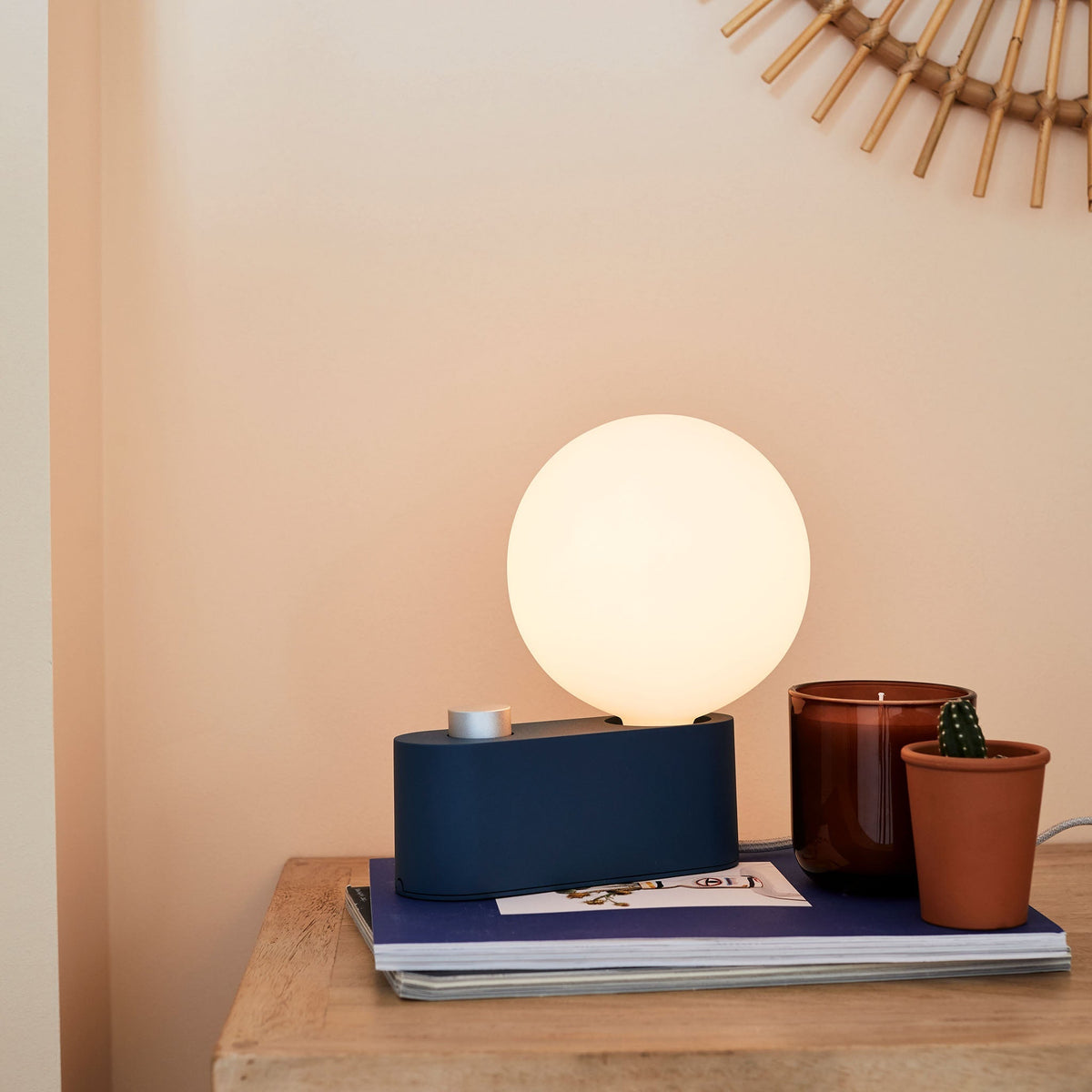 Alumina Lamp in Sapphire in a hallway, close-up