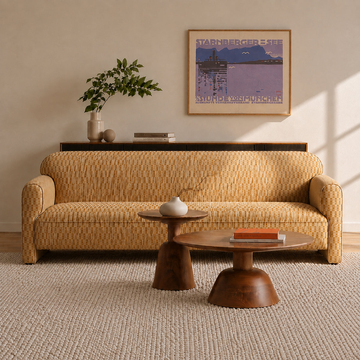 A mid-century modern sofa with chartreuse, geometric fabric in a styled living room setting with wooden coffee tables, a textured rug, and a framed poster on the wall.