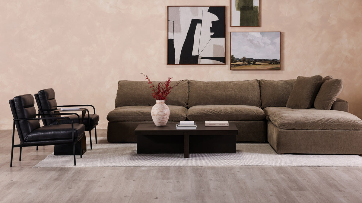 Moe's Home Collection Folke rectangular coffee table in solid oak with a Dark Brown finish, nearly black against a peach plaster wall and an olive sectional