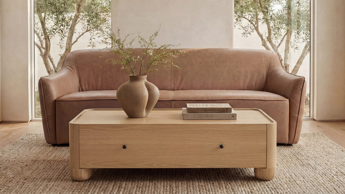 Moe's Home Collection Gibson coffee table in the Natural finish, the same pale oak silhouette and styling shown in the same room so the two finishes can be compared directly