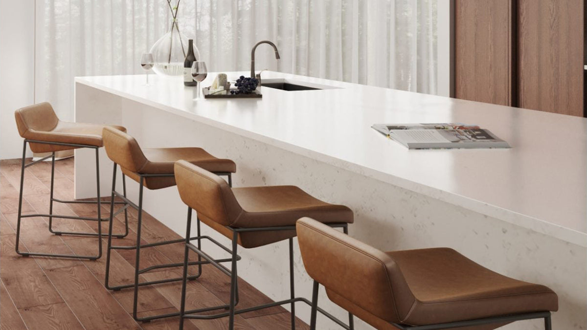 The Starlet Counter Stool by Moe's Home Collection, top grain leather on an iron frame, sold as a set of two, in a room setting